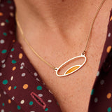 Delicate gold oval necklace
